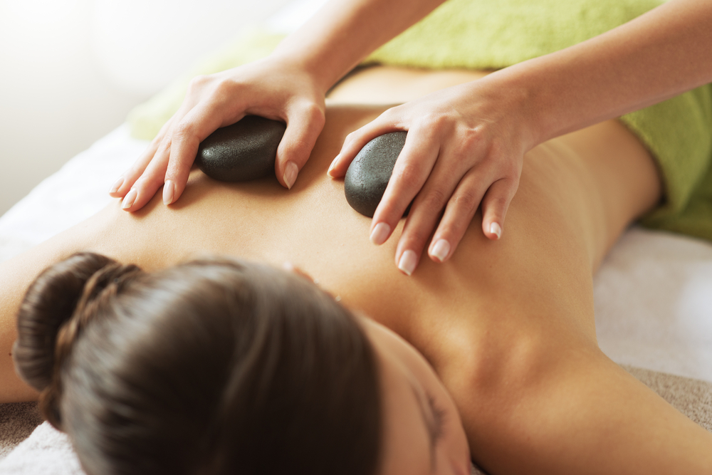 The Power of Hot Massage Therapy -Stone Massage Steps and Benefits [+ FAQs]  - Healthwire