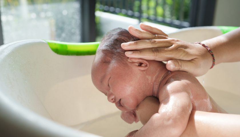 applying-soap-on-baby-face